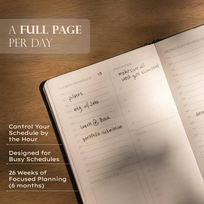The Daily Planner - Hardcover with Library Buckram Cover: Black