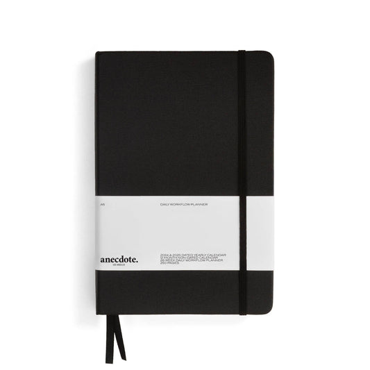 The Daily Planner - Hardcover with Library Buckram Cover: Black